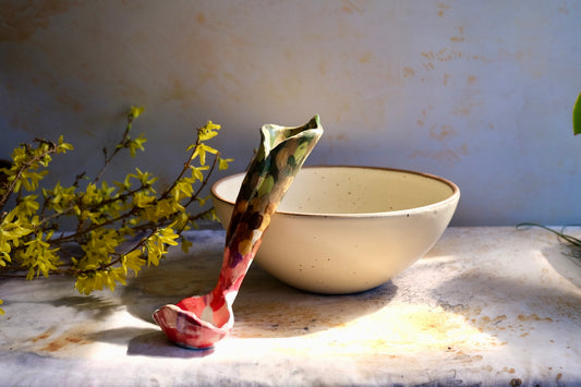 Gentle fold vase ladle
